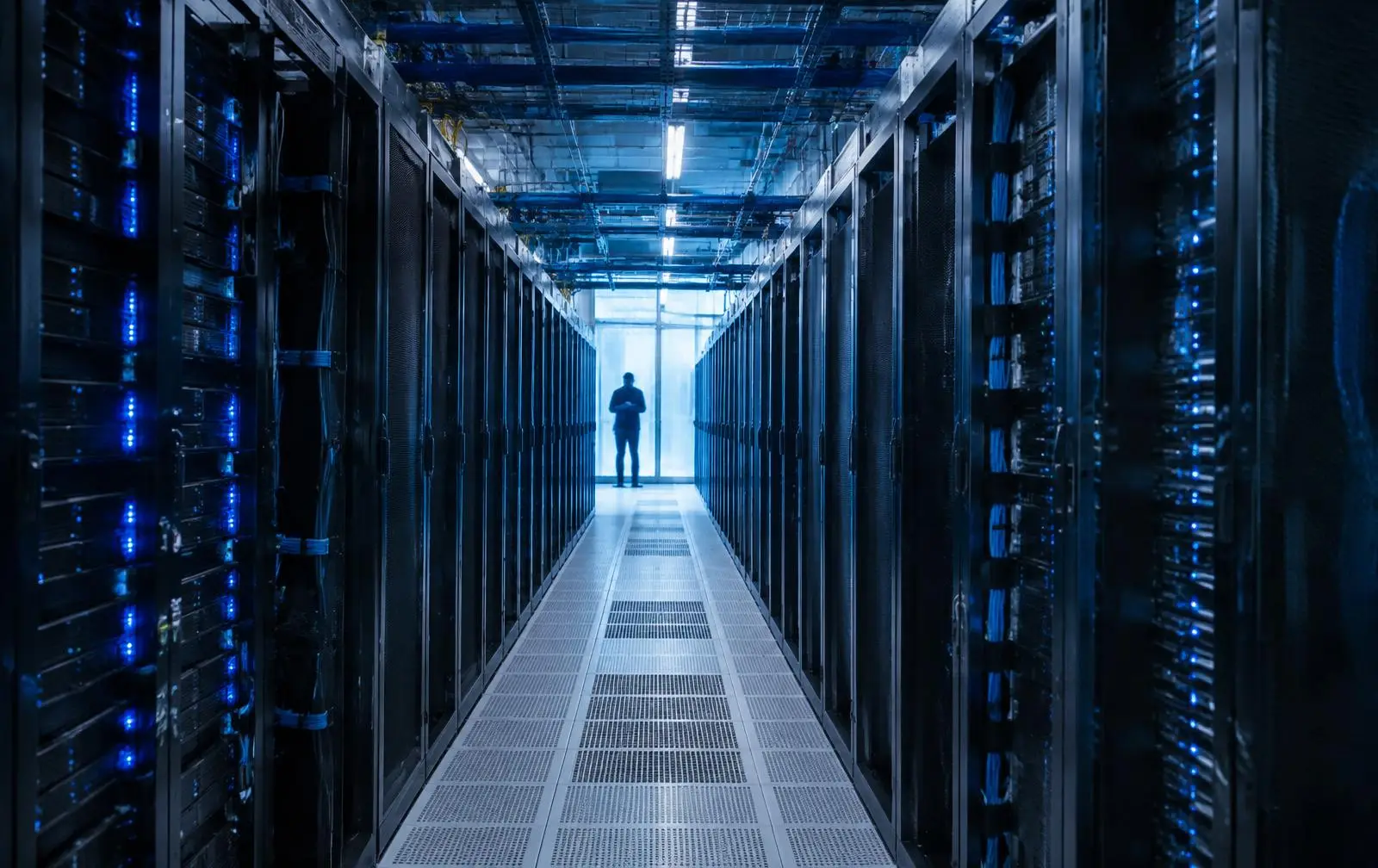 Aisle of GPU server racks in a data centre